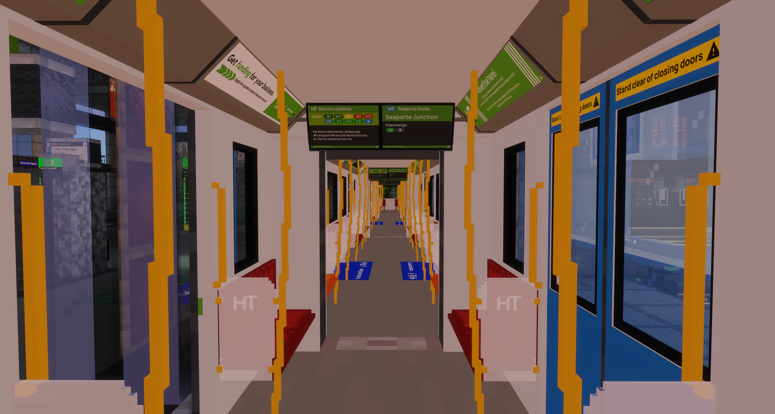 An image of the interior of an X Stock train with Passenger Information Displays