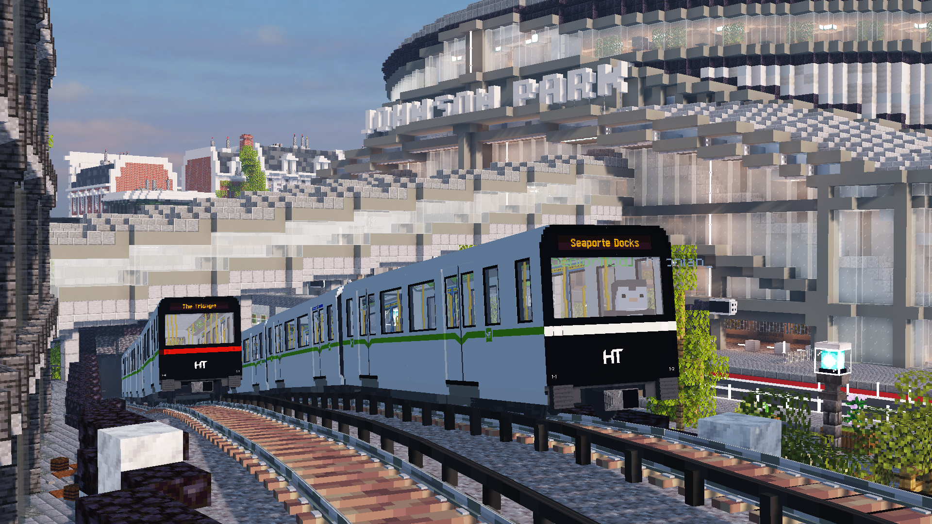 Image of two M5 Metro trains passing each other at the Johnson Park tunnel portal